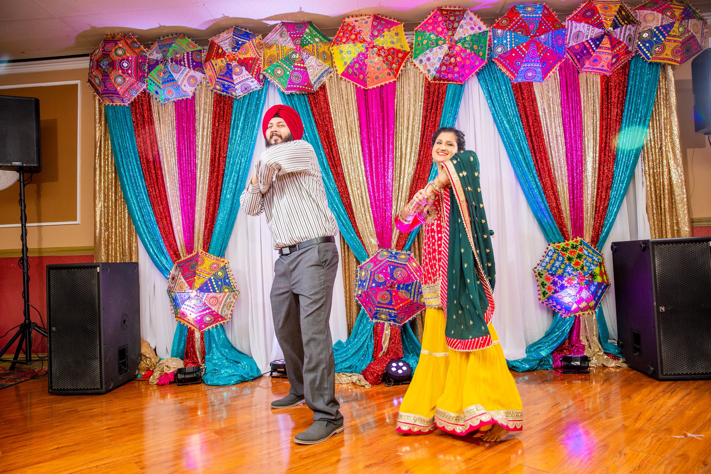 Aman lohri event 2022 lohri stage dance umbrella backdrop