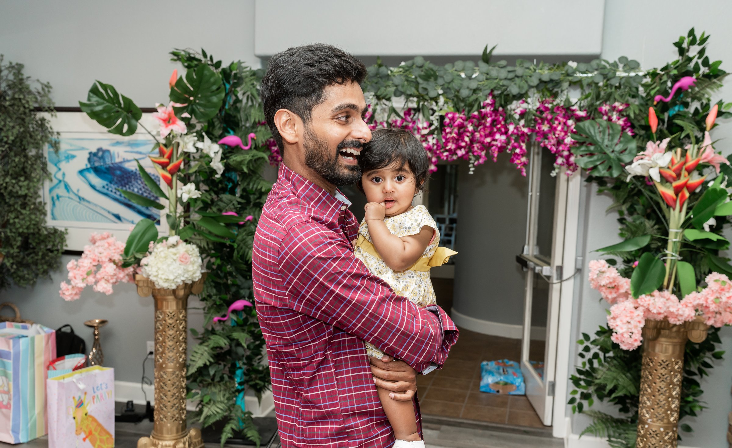 Samyukhta's birthday father holding daughter mid laugh
