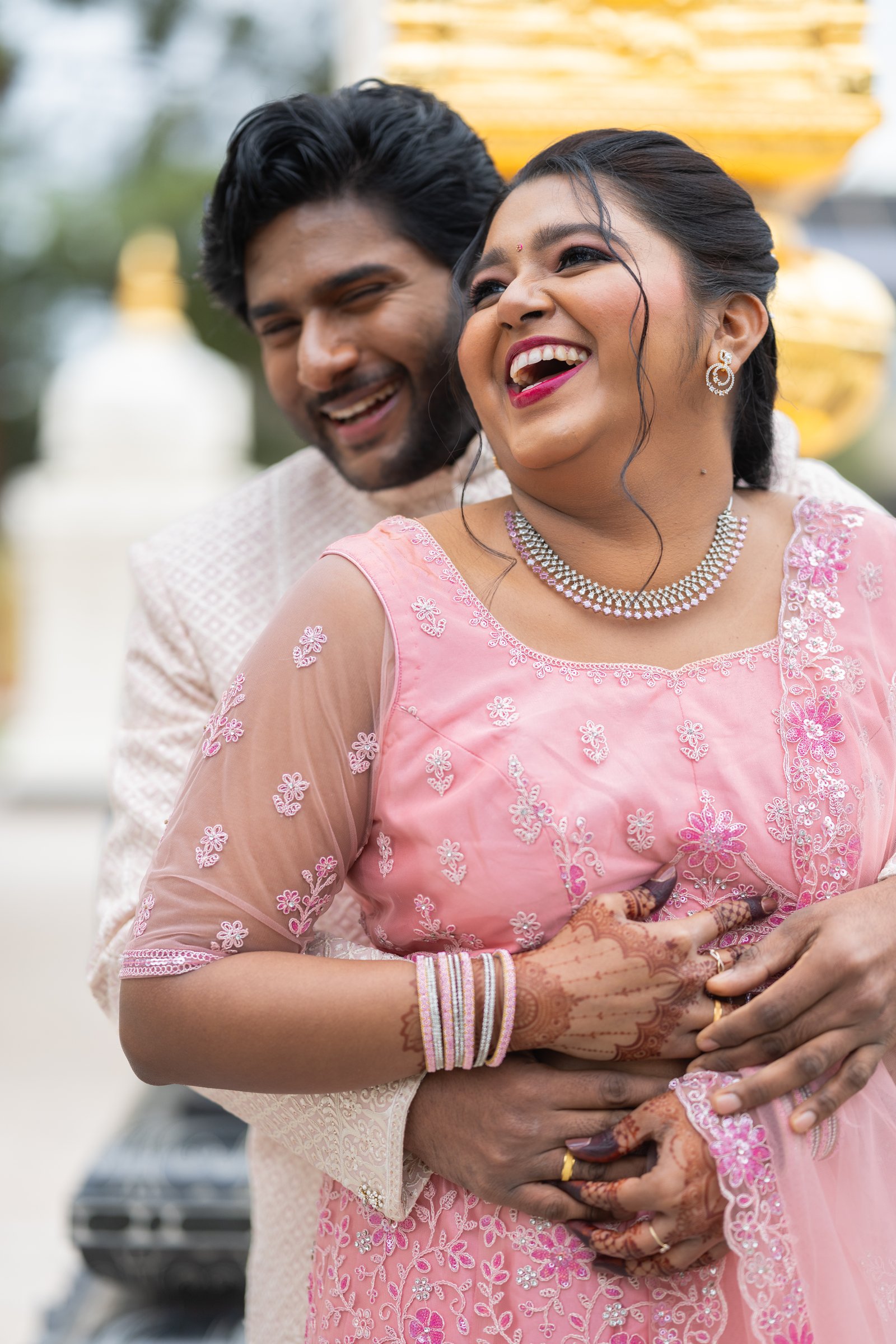 Saranya and dinesh shared laugh outside the temple