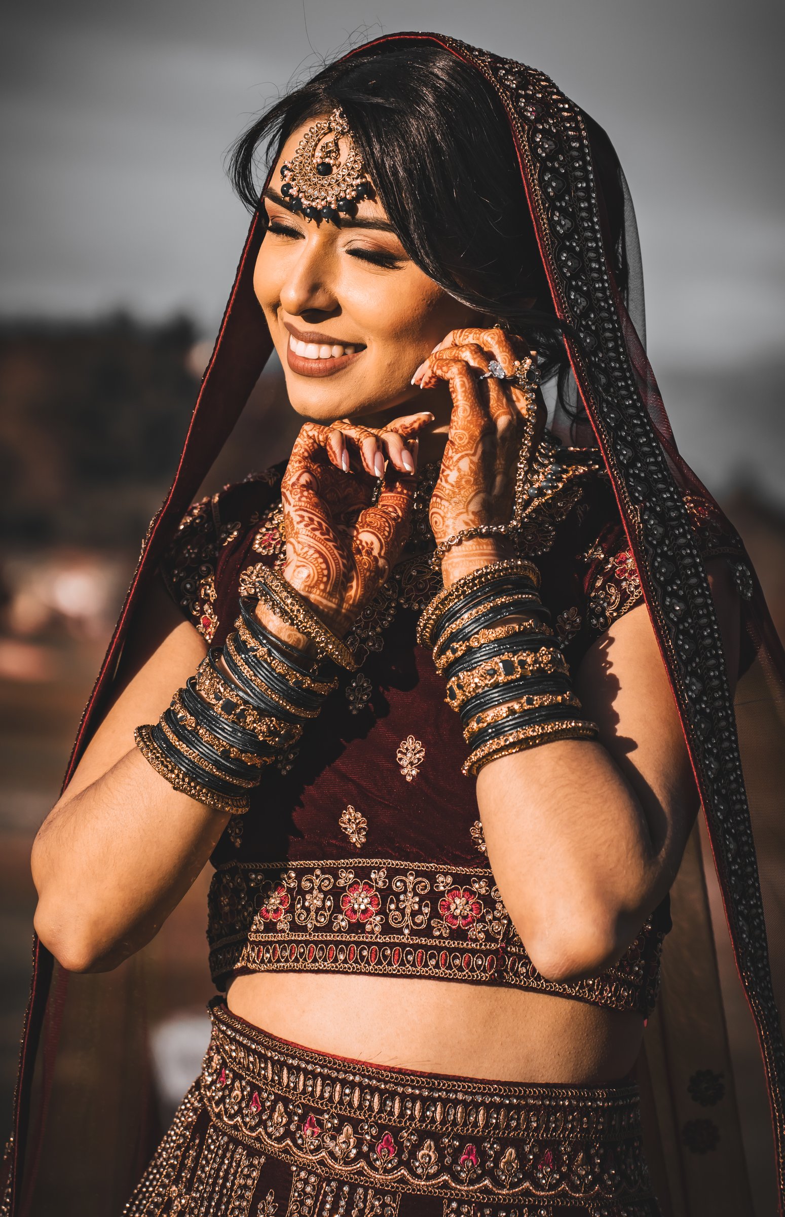 Jaslyn and eduardo's nikkah bride laughing henna hands