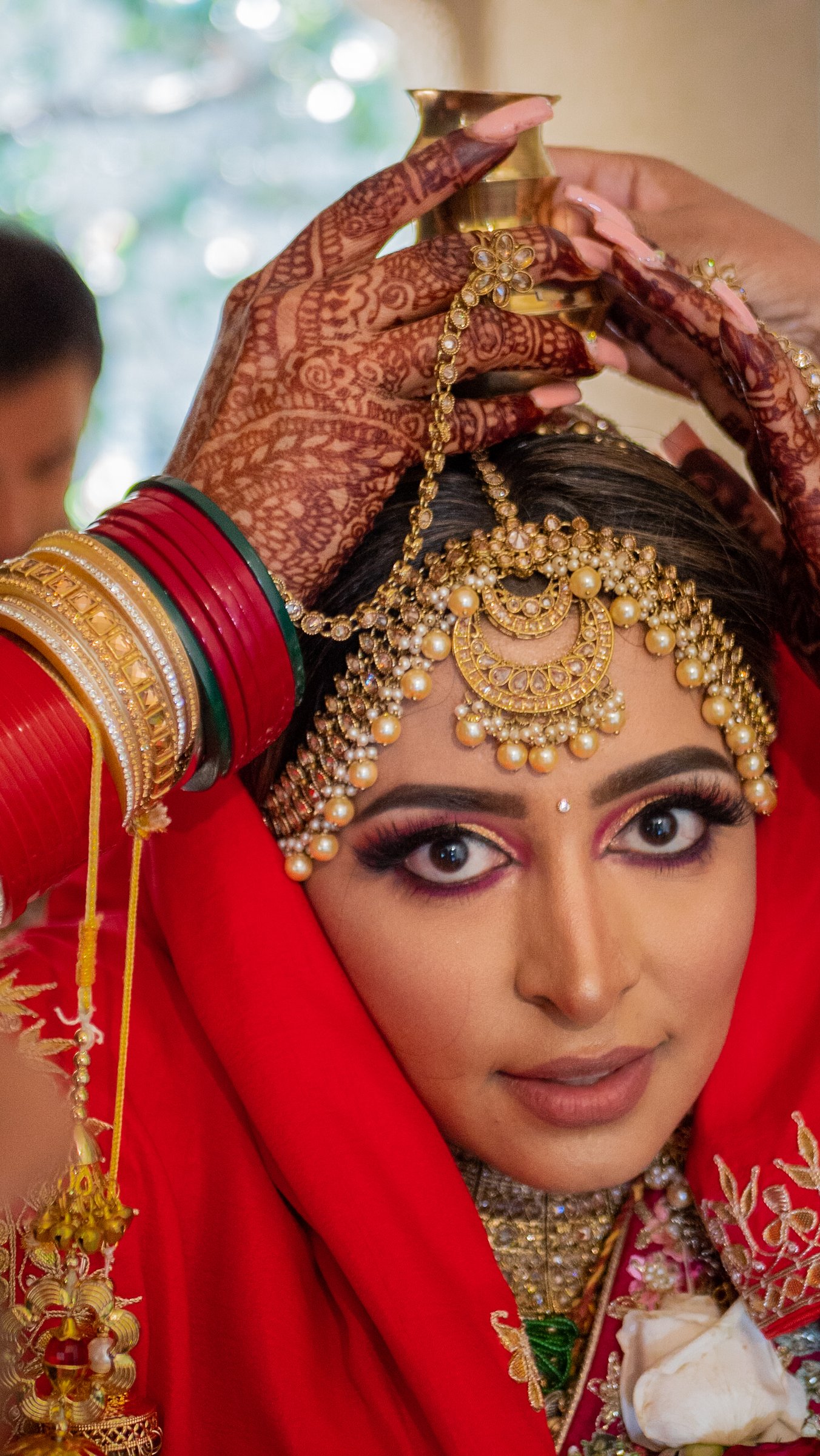 Rohini and anirudha bride direct gaze under kalash