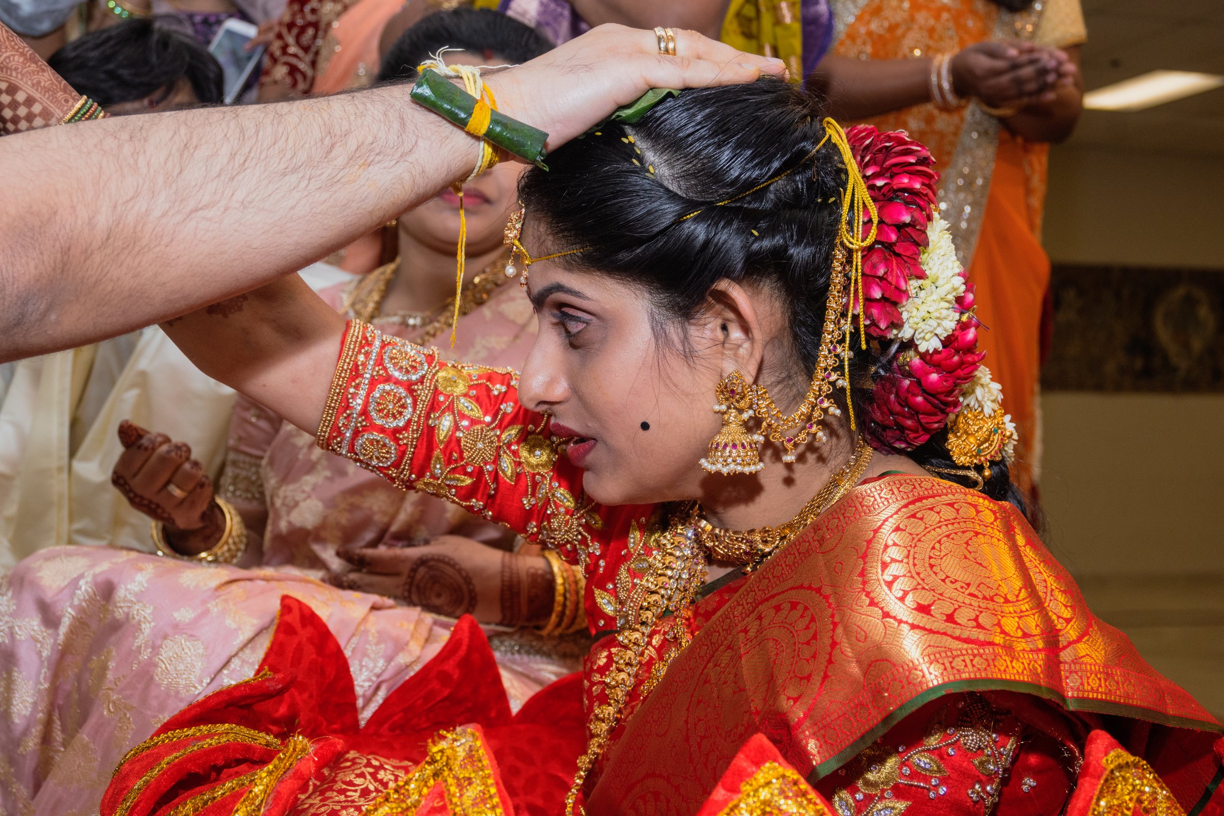 Supriya wedding bride profile hands overhead
