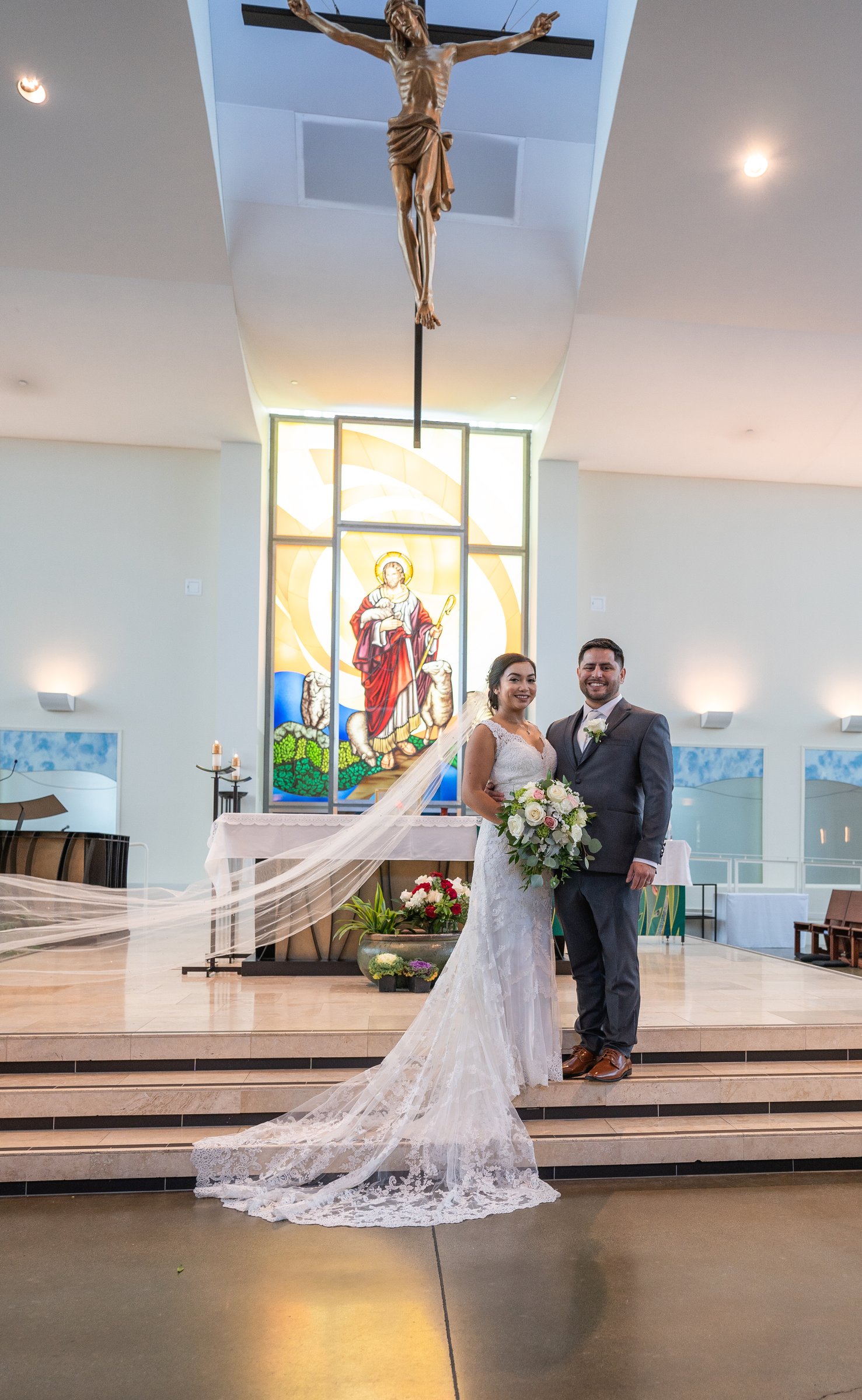 Vanessa and jimmy veil sweeping across the altar