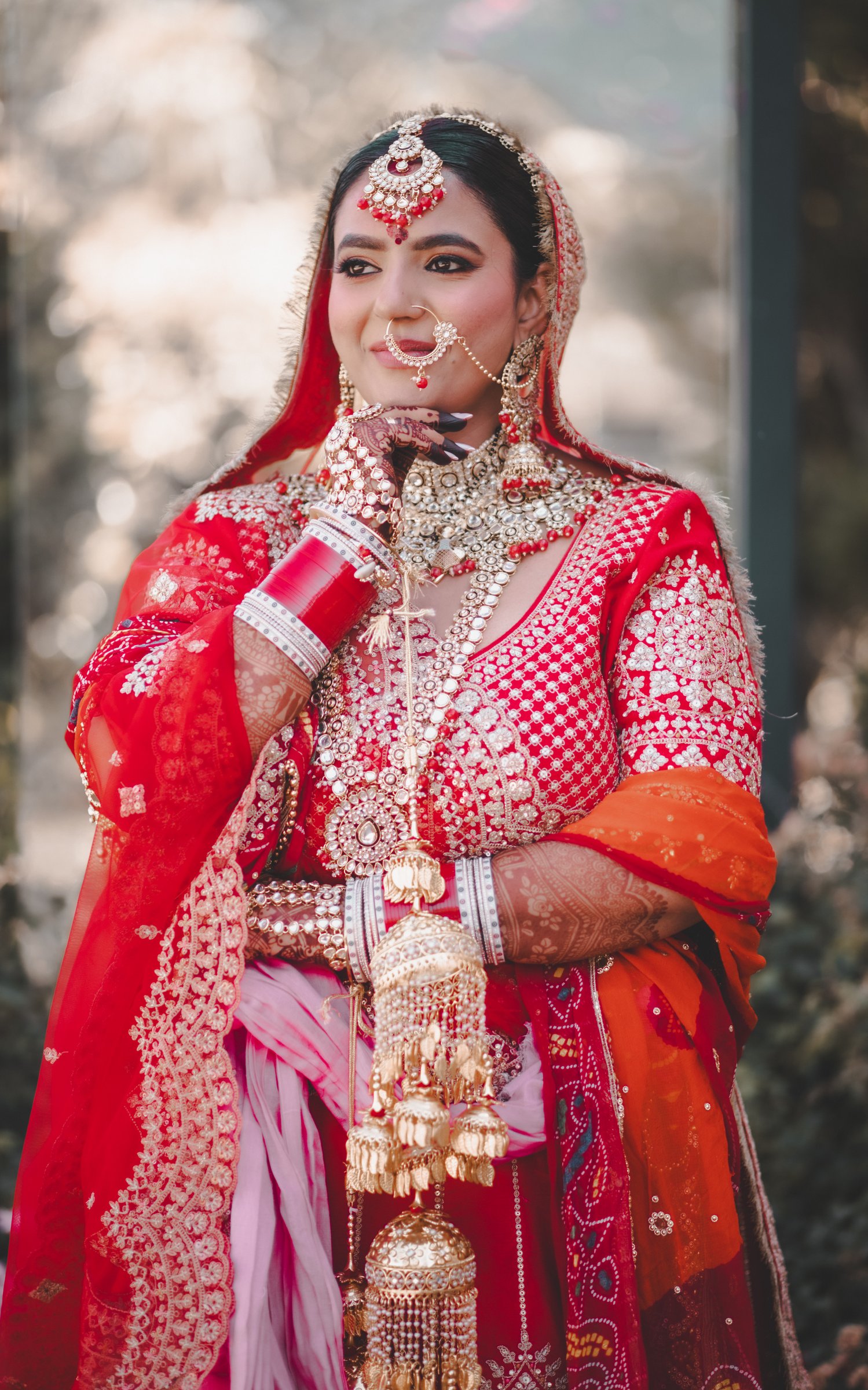 Varunika bridal portrait hand to chin